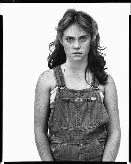 A girl in denim dungarees