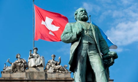 The statue of Alfred Escher, modern Switzerland’s founding father, watches over the Paradeplatz square in Zurich. Escher founded Credit Suisse in 1856, but commentators suggest its takeover by rival UBS is an ominous sign for the republic