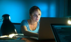 woman uses laptop