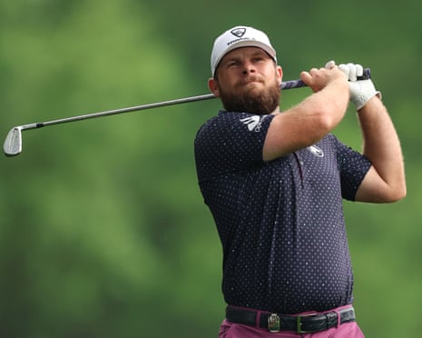 Tyrrell Hatton hits his second shot on the 10th hole during the second round