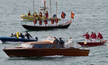 Pope Francis is greeted by gondoliers upon his arrival in Venice.