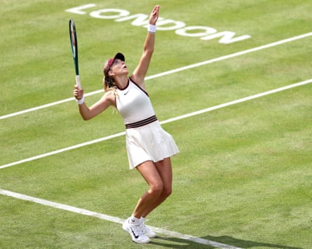 Katie Boulter serves against Ajla Tomljanovic during her women's singles match at Queen's Club