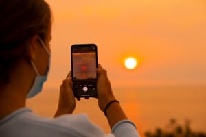 A local captures a hazy sunset
