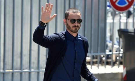 Juventus’ player Leonardo Bonucci waves as he arrives at the Caselle airport in Turin.