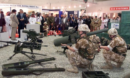 British soldiers display the use of their weapons at an arms exhibition in Abu Dhabi.