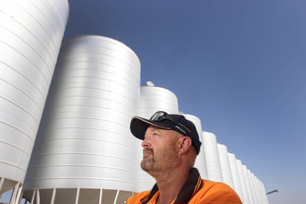 Deane Munro near his family’s grain silos