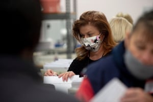 Staff of the Franklin County Board of Elections sort through, and de-stub both mail in ballots and provisional ballots on April 28, 2020 in Columbus, Ohio on the final day of the the primary election.
