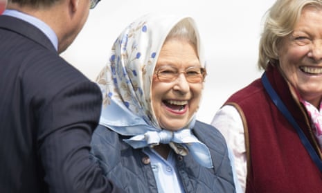 Queen Elizabeth II smiles on receiving Tesco vouchers after her horse won the Tattersalls & RoR Thoroughbred Ridden Show