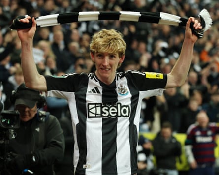 Anthony Gordon brandishes a Newcastle scarf