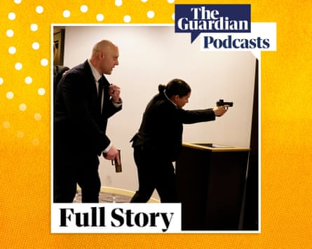 Agents draw their guns after loud bangs were heard during the White House Correspondents' dinner at the Washington Hilton in Washington, DC, on April 25, 2026.