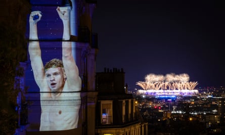 Léon Marchand is projected in Montmartre during the closing ceremony