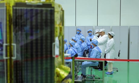 This picture released by North Korea's official Korean Central News Agency (KCNA) on 17 May 2023 shows North Korean leader Kim Jong-un and his daughter, presumed to be named Ju Ae, inspecting a military reconnaissance satellite at an undisclosed location in North Korea.