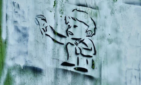 Graffiti of a child begging on a charity donation bank in Reading, May 2021.
