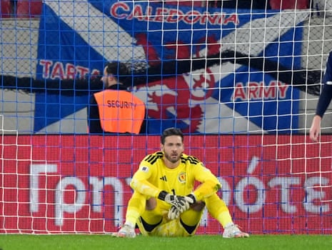 Scotland goalkeeper Craig Gordon reacts after Greece scored their first goal.