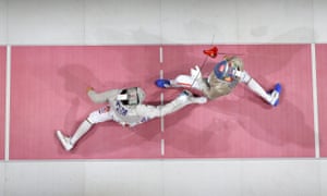 Luigi Samele of Italy (right) loses his sabre as he competes against and Junghwan Kim of Korea in their men’s sabre individual semi-final.