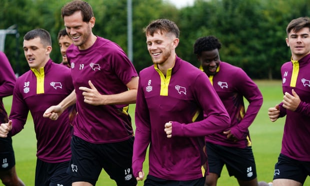 Midfielder Jason Knight (No 38), Richard Stearman (19), and midfielder Max Bird (8) have a training session at Moor Farm.