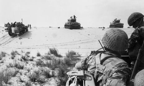 Israeli armoured forces in action in the Sinai Desert, 5 June 1967. 
