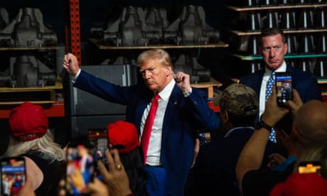 TOPSHOT-US-POLITICS-STRIKE-UNIONS-TRUMP<br>TOPSHOT - Former US President and 2024 presidential hopeful Donald Trump gestures while speaking at Drake Enterprises, an automotive parts manufacturer and supplier, in Clinton, Michigan, on September 27, 2023. Both Trump and Biden are visiting Michigan this week, in what is their first major skirmish of a long fight for voters in working-class swing states ahead of the November 2024 election. Biden on September 26, 2023, became the first sitting president to stand on a picket line, supporting calls by the United Auto Workers (UAW) union for the Big Three Detroit carmakers to raise wages. And Trump is skipping a debate in California with his trailing Republican rivals on September 27 to head instead for a small, non-union car parts factory on the other side of Detroit. (Photo by Matthew Hatcher / AFP) (Photo by MATTHEW HATCHER/AFP via Getty Images)