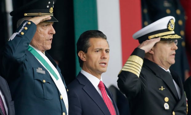 Mexico’s President Enrique Pena Nieto (centre) during a military parade in celebration of the 104th anniversary of the Mexican Revolution in November.
