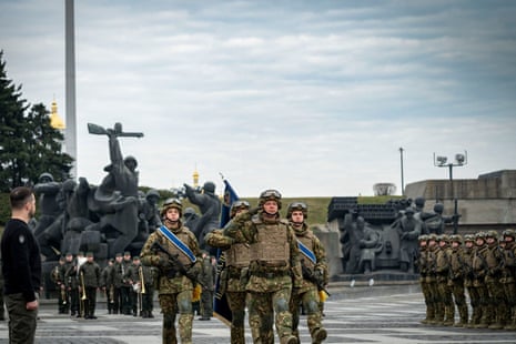 President Volodymyr Zelenskiy reviewing the troops during a parade for a ceremony of the 9th anniversary of the National Guard of Ukraine and the graduation of the officers of the National Academy of Ukraine, in Kyiv