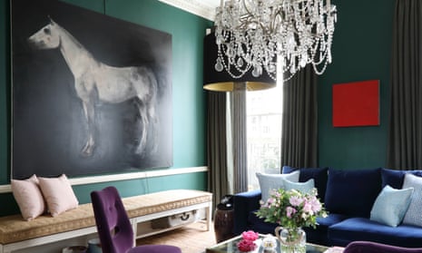 Bold colours: green paint contrasts with the midnight blue velvet sofas in interior designer Ana Engelhorn’s home.
