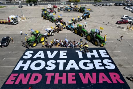 An aerial picture shows a tractor protest organised by the Kibbutz Movement and the Hostages Families, before the convoy headed towards Hostages Square in Tel Aviv on Saturday.