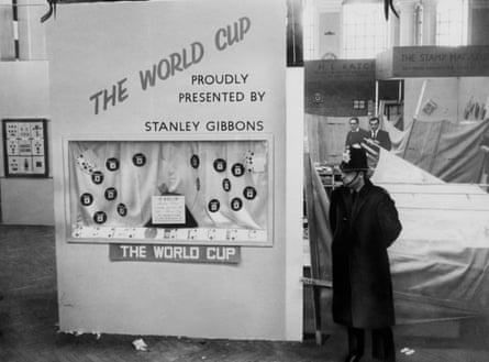 A policeman stands guard in Central Hall, next to the stand at the National Stamp Exhibition where the Jules Rimet trophy was housed before it was stolen.