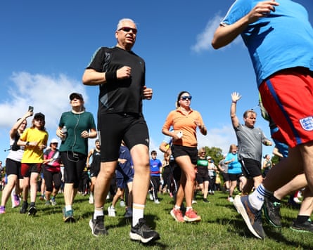 People running in a field