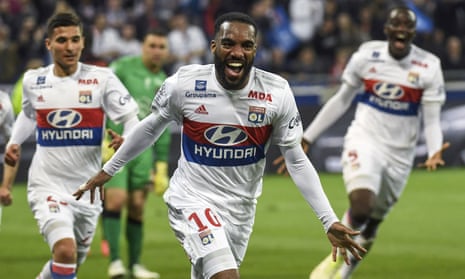 Alexandre Lacazette, here celebrating a goal for Lyon, would cost Arsenal more than the £42.5m paid for Mesut Özil in 2013.