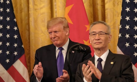 Donald Trump and Chinese vice premier Liu He applaud