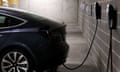 A Tesla Model Y charges at a EV charge station in Lane Cove on January 19, 2021 in Sydney, Australia.