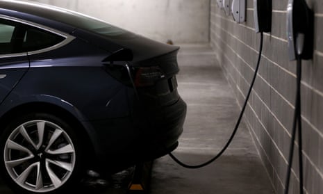 A Tesla Model Y at an EV charging station in Sydney