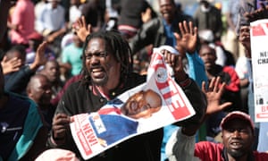 Protestors take part in a march organised by the Movemnet for Democratic Change.