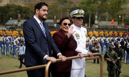 President Xiomara Castro, center, with the minister of defense, Jose Manuel Zelaya, and the chairman of the Joint Chiefs of Staff, Jose Jorge Fortin, at a military ceremony in Tegucigalpa on 9 December.