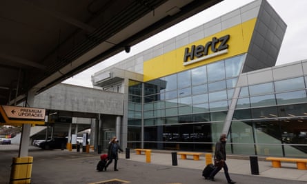 A Hertz rental car sign is seen at JFK international airport in Queens, New York. J