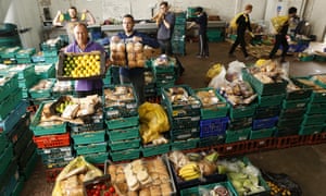 Keith Annal (front left) and other Real Junk Food Project team members at its food rescue warehouse in Leed