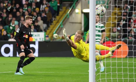 Joe Hart, Celtic’s goalkeeper, can only watch as Timo Werner (left) beats him for Leipzig’s first goal.