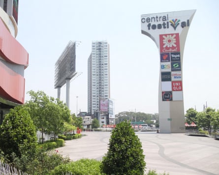 A pillar advertising shops in Chiang Mai