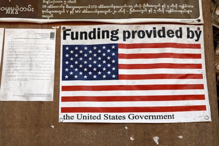 A poster with the US flag and the words ‘Funding provided by the US government’ at a refugee camp on the Thai/Myanmar border,