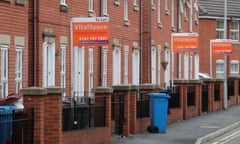 To let boards outside homes in Hulme, Manchester