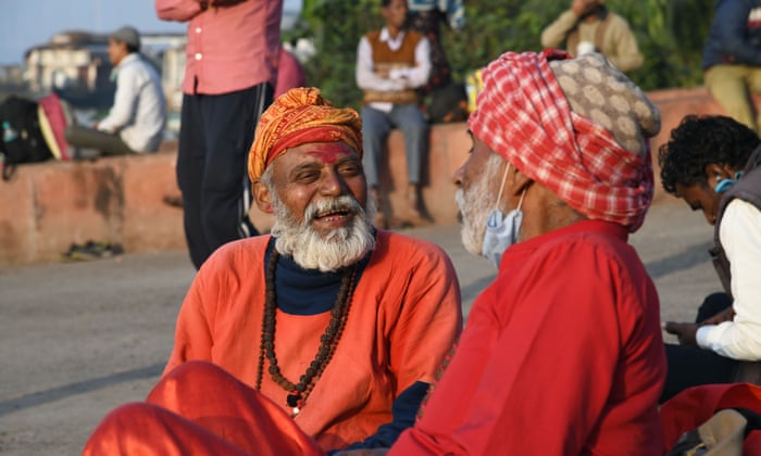 Two Sadhus seen making their way to the annual Hindu festival at the Gangasagar.