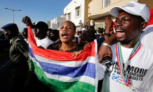 Supporters of Adama Barrow celebrate his inauguration in Dakar.