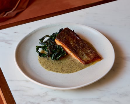 Willy’s chalk stream trout with cavolo nero in seaweed butter sauce.