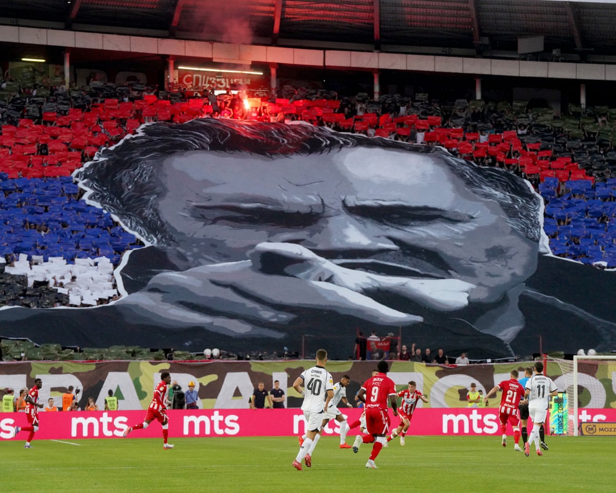 Red Star Belgrade supporters form a tifo depicting the late former Bosnian Serb military chief Ratko Mladić during the Serbian SuperLiga football match between Red Star Belgrade and Partizan Belgrade in Belgrade last weekend.