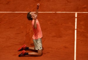 Zverev falls to his knees as he celebrates his win against Khachanov.