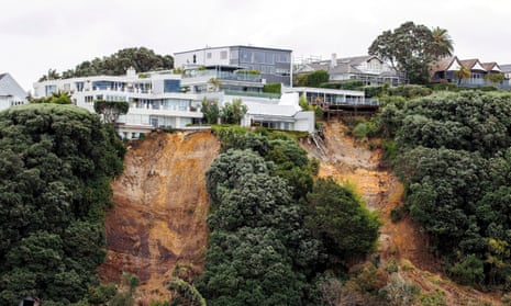 A landslip near a house on a clifftop caused by continuous bad weather as Cyclone Gabrielle approached Auckland on Monday.