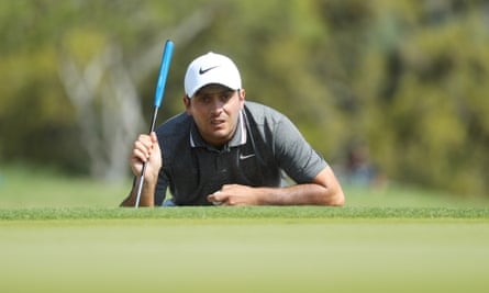 Francesco Molinari lines up a putt on the first green ion his way to a commanding win against Satoshi Kodaira.