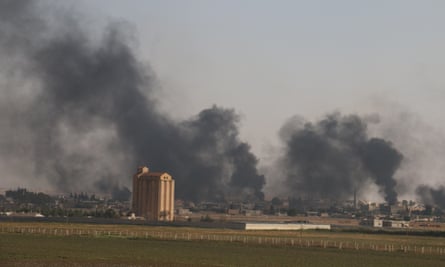 Smoke rises above the Syrian town of Tel Abyad