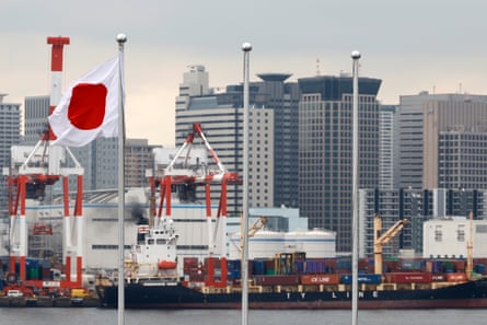 A container ship berths at a port in Tokyo.