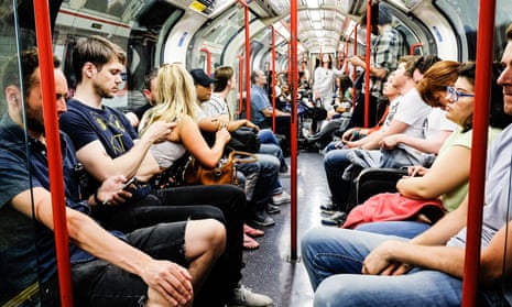 passengers in a London tube carriage